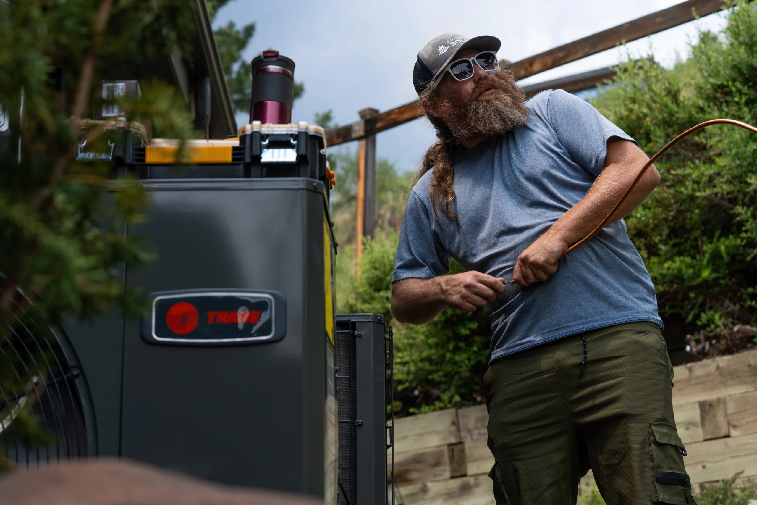 HVAC Technician In Northern Colorado Finishing A Heat Pump Installation