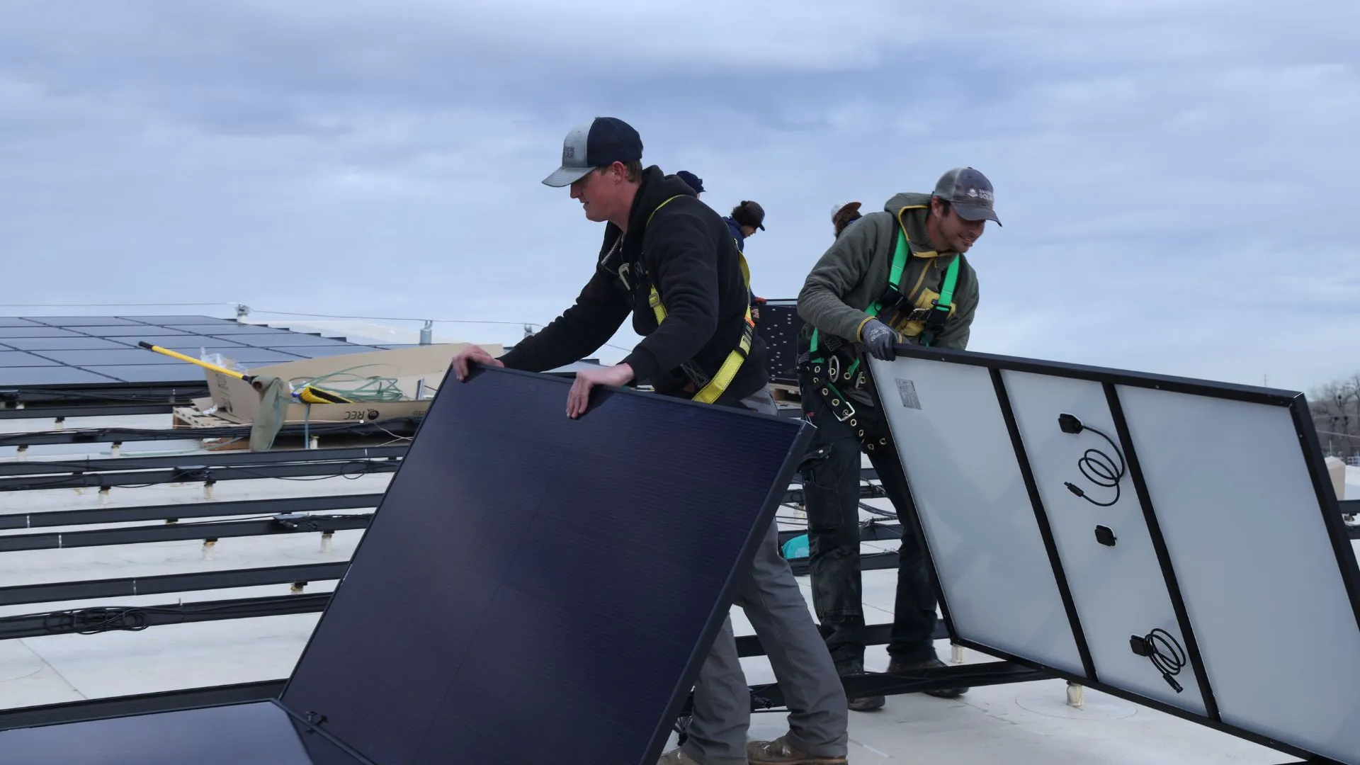 Solar Installers Working On A Commercial Solar Array Project