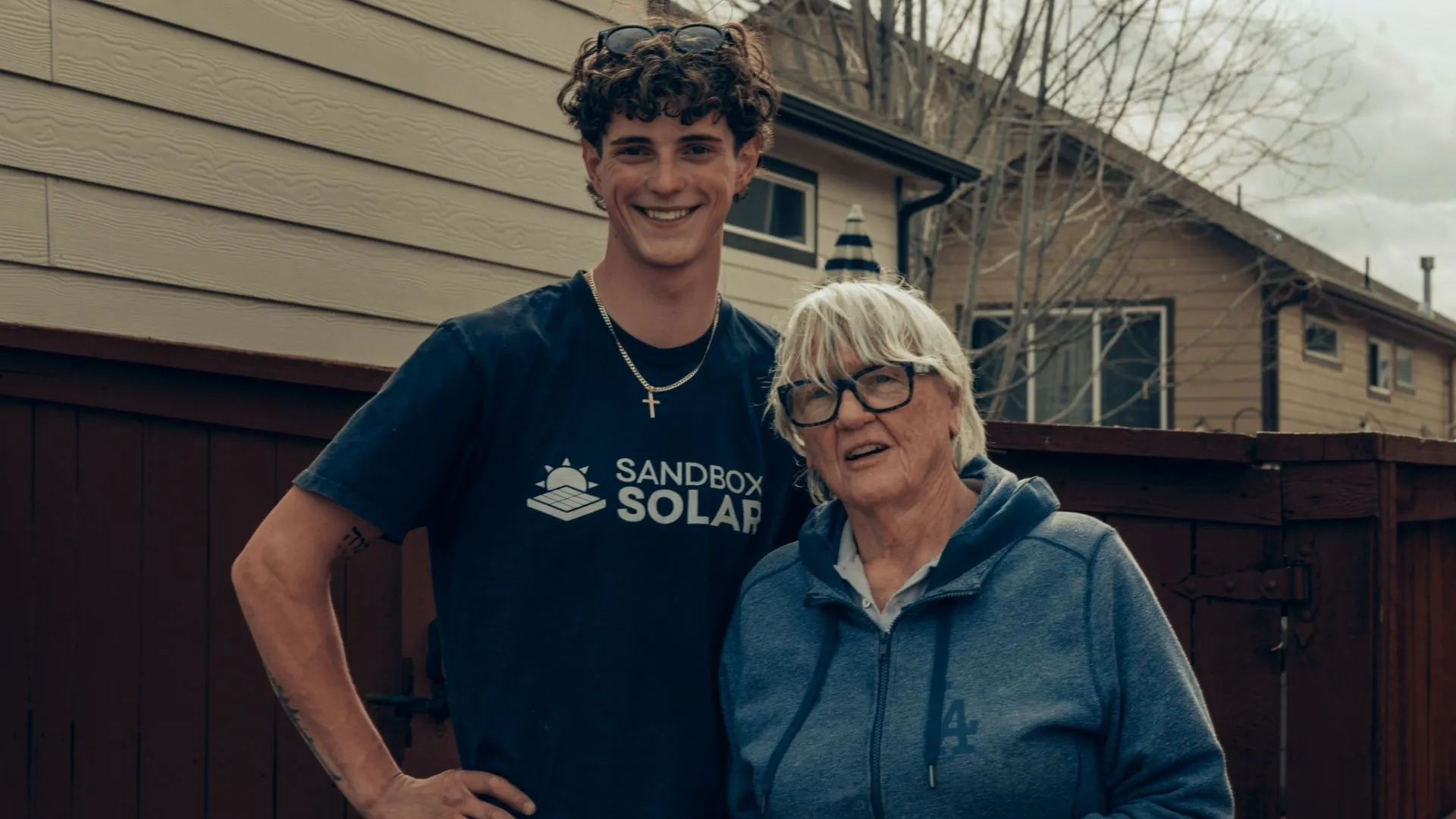 Solar Installer With A Happy Homeowner