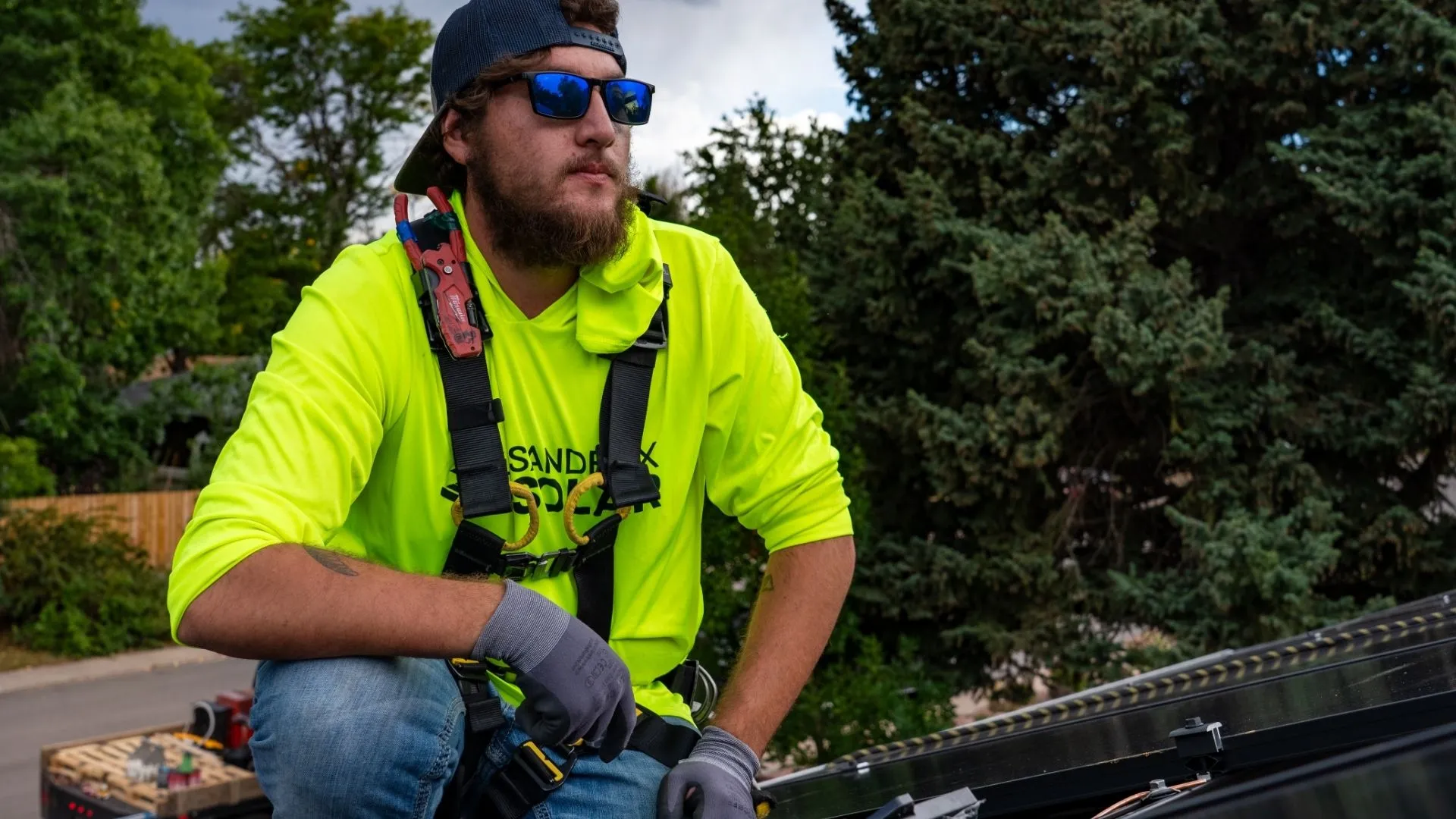 Solar Installer Working On A Residential Roof In Northern Colorado