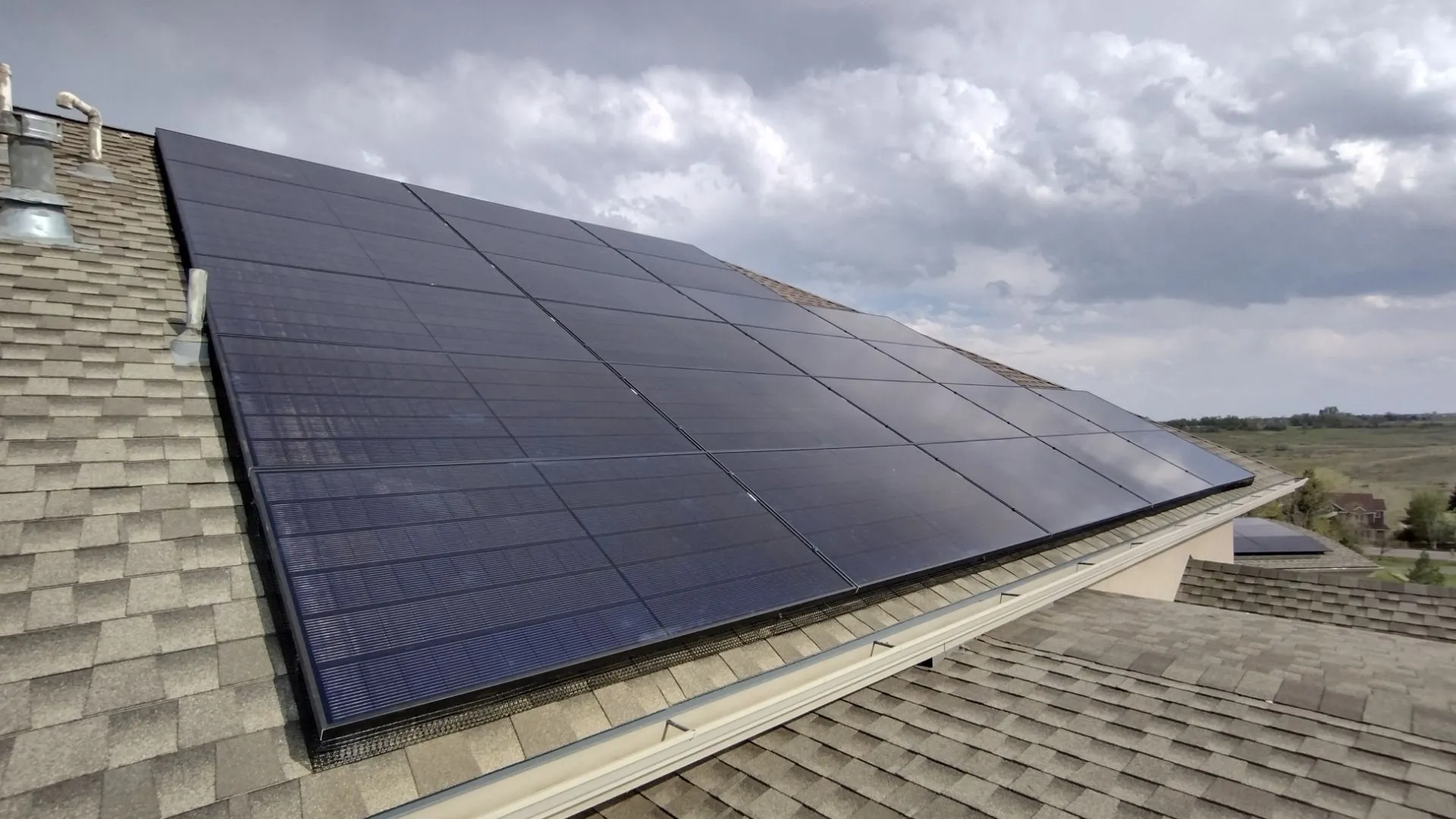 Newly Installed Solar Panels On A Residential Roof Newly Installed Solar Panels On A Residential Roof