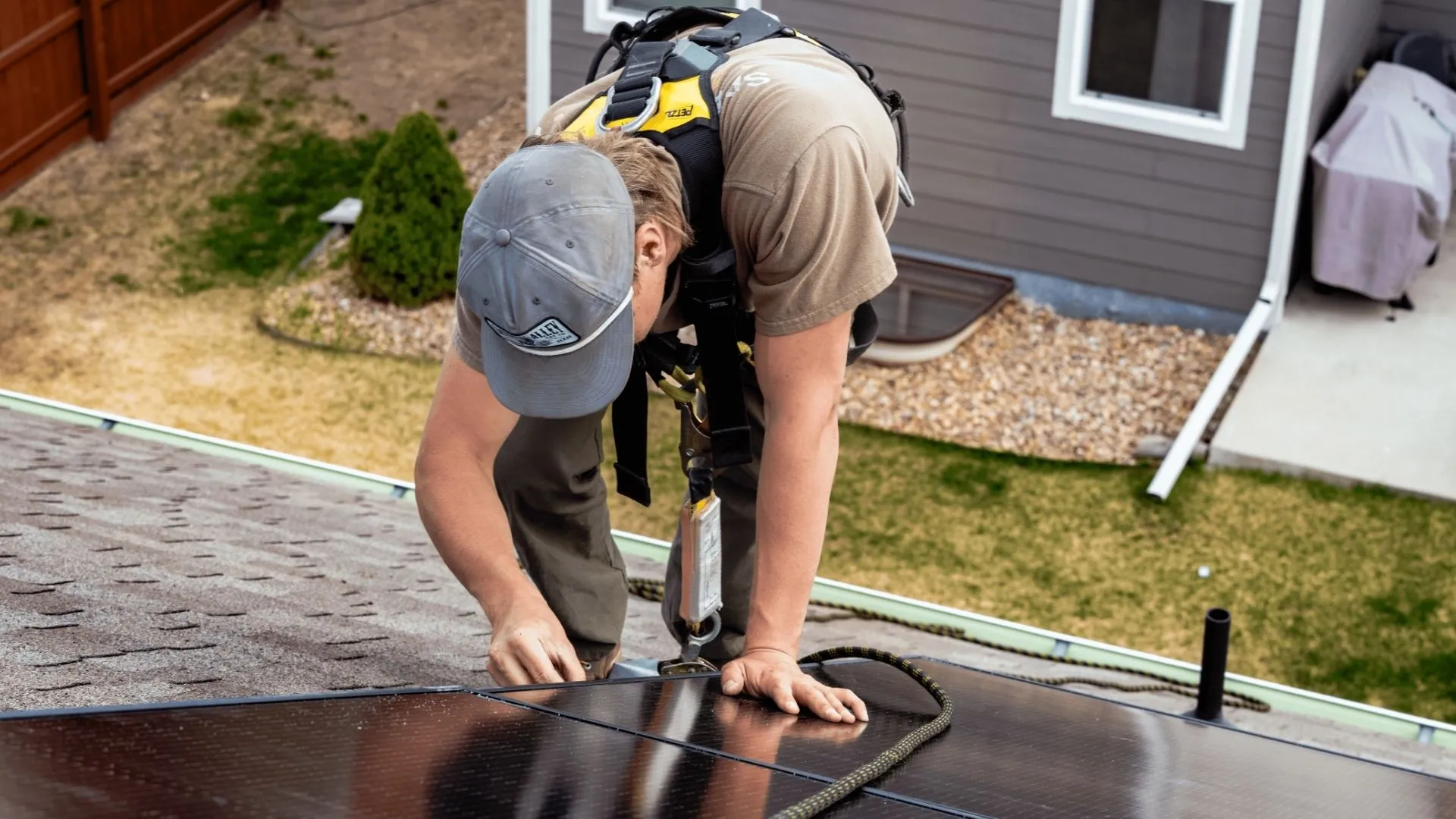 Residential Solar Installer Working On Site Residential Solar Installer Working On Site