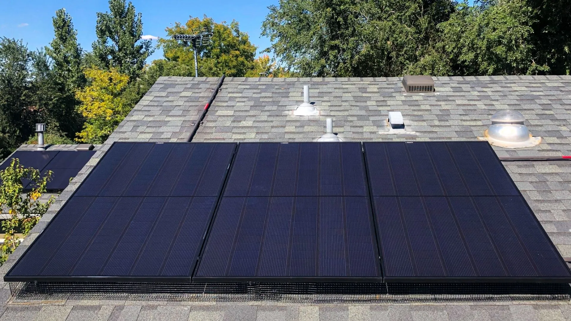 Solar Panels Installed on a Residential Roof Solar Panels Installed on a Residential Roof